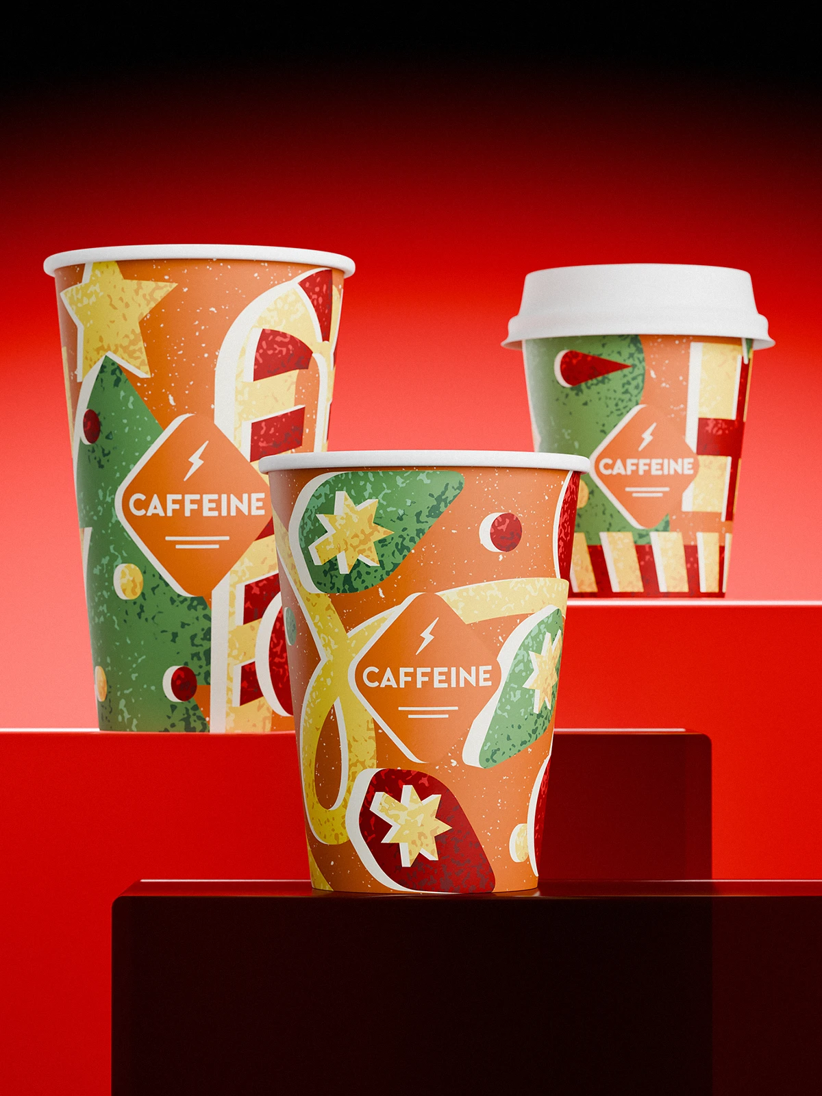 Three CAFFEINE Christmas edition cups (2024) placed on red blocks with a bright red background. The cups are decorated in orange, green, yellow, and red with festive motifs — stars, baubles, candy shapes, and abstract ornaments — with the CAFFEINE logo in a diamond frame.