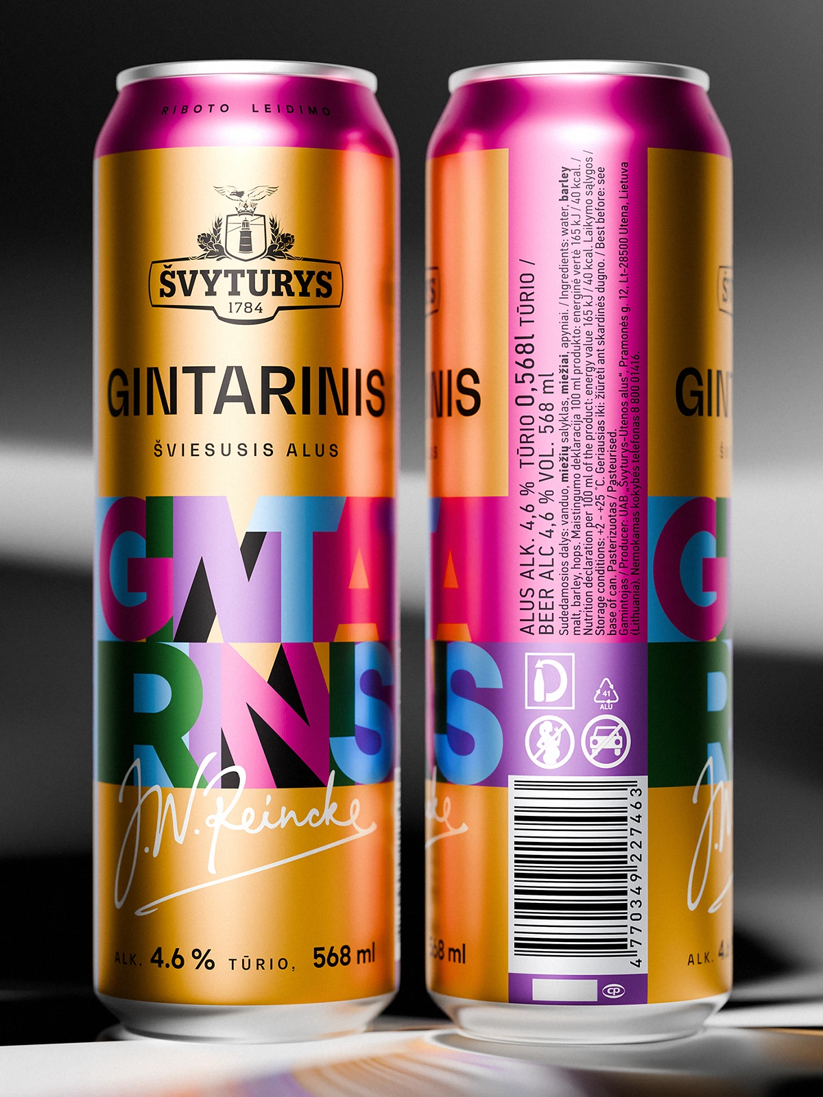Two Švyturys Gintarinis limited-edition beer cans standing side by side against a neutral gradient background. The design features a metallic gold base with bold, overlapping letters in vibrant magenta, cyan, green, and purple. The playful composition and reflective finish emphasize the energetic, retro-inspired reinterpretation of the classic Lithuanian lager.
